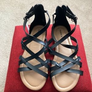 Torrid black strap sanders with zipper up back.